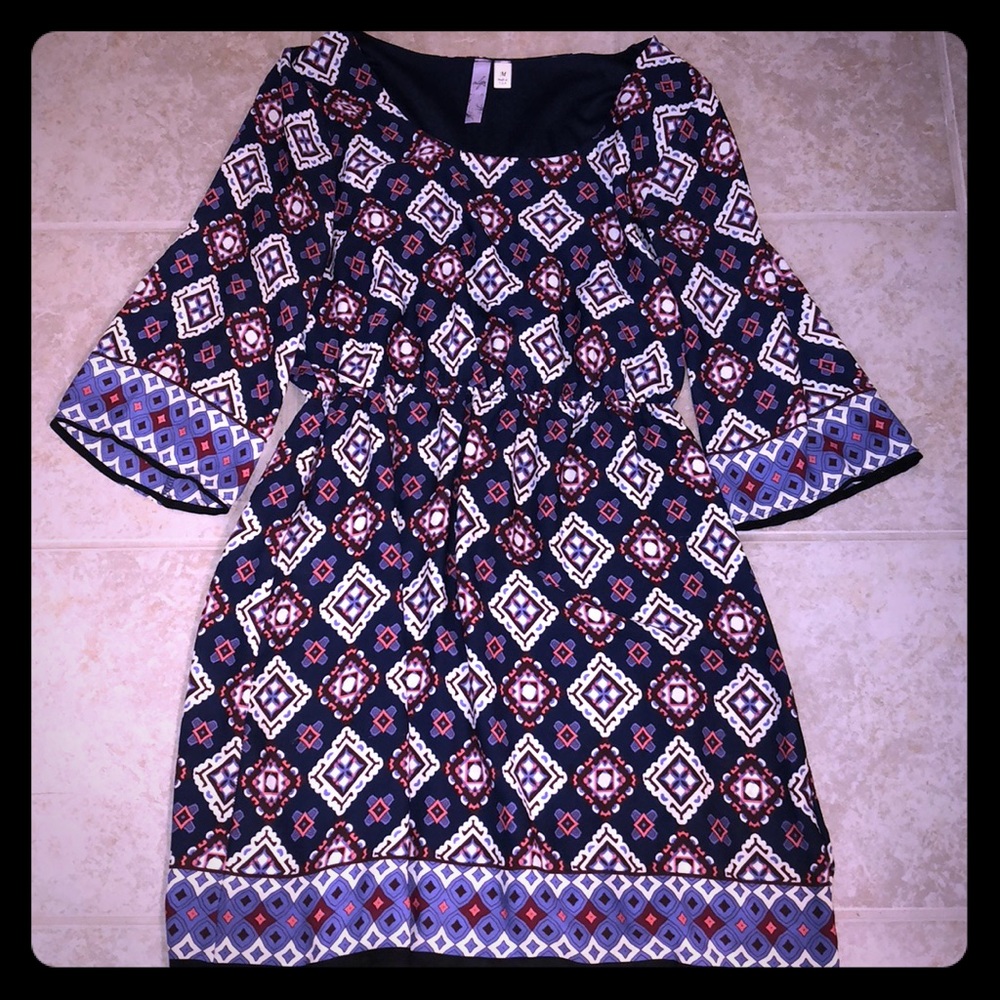 Beautiful 70’s inspired midi dress!